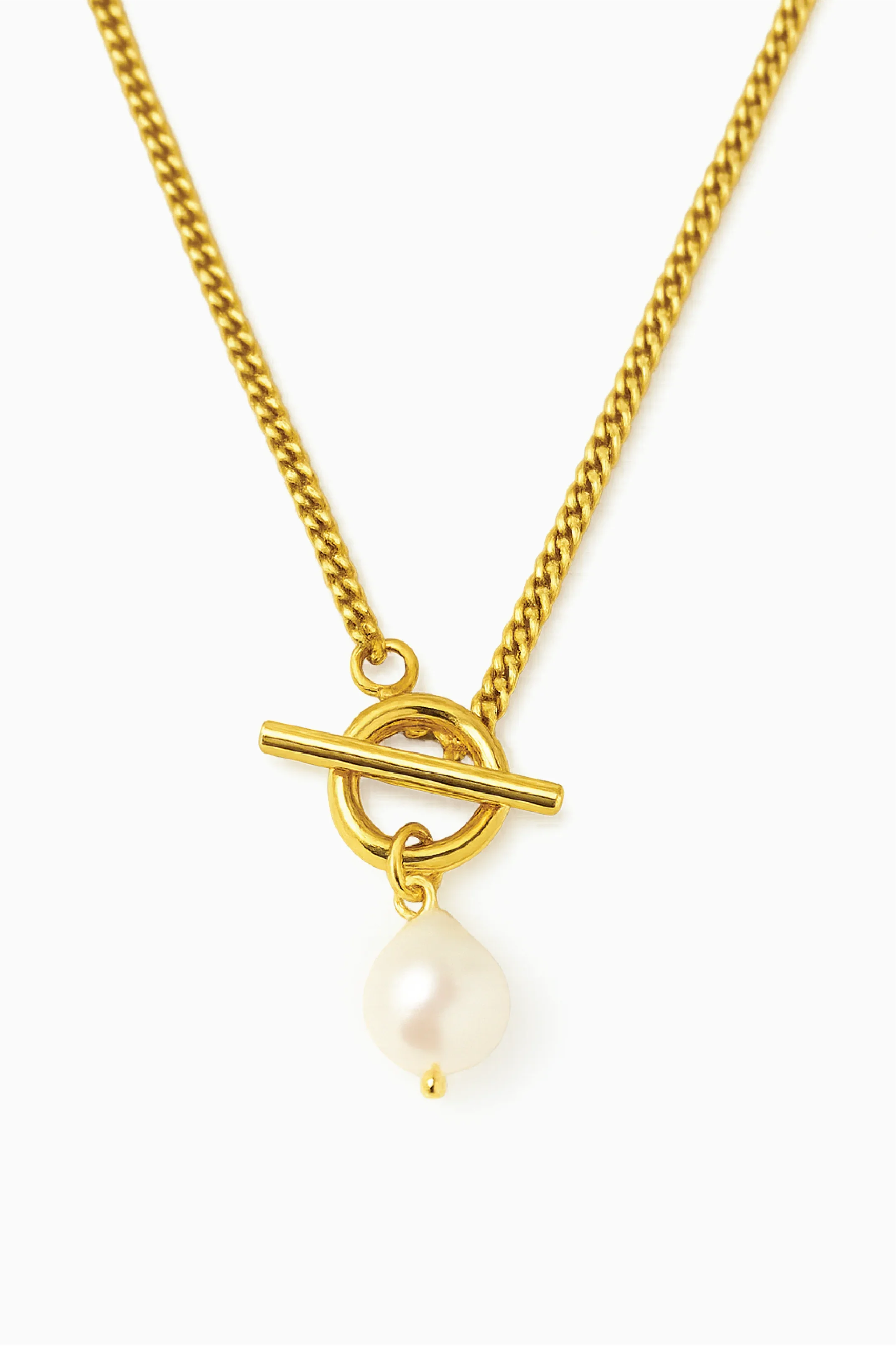 Gold necklace with a pearl pendant on a white background