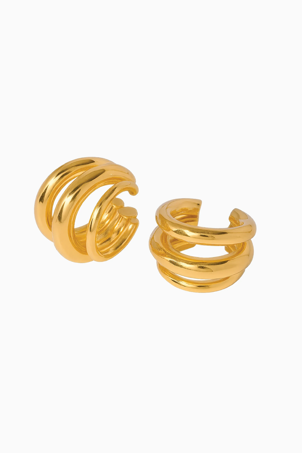 Pair of gold spiral earrings on a white background