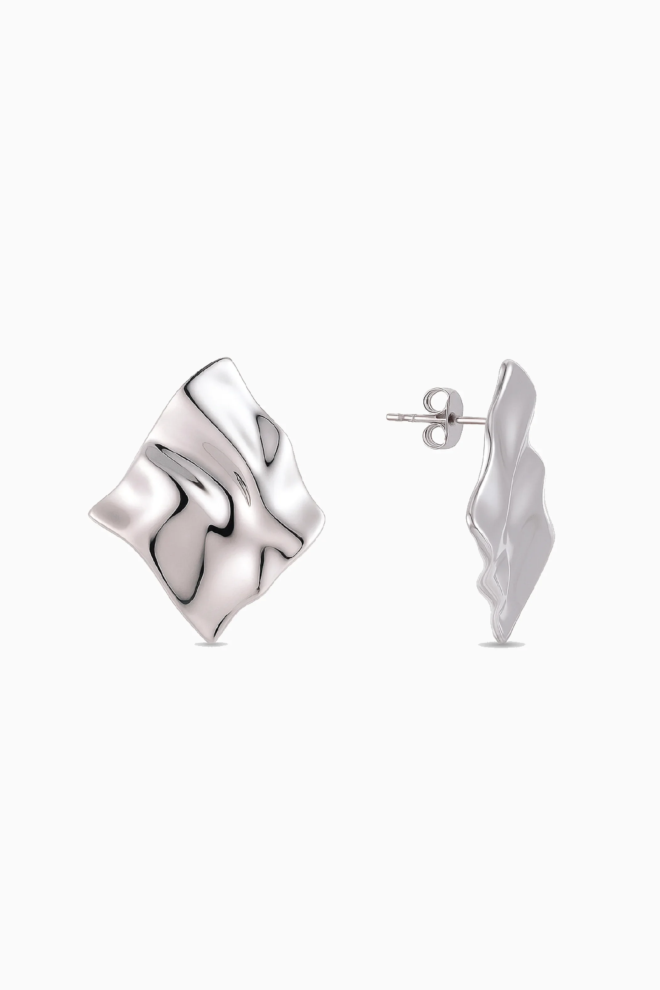 Silver abstract earring on a white background