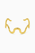 Gold cat-shaped ring on a white background