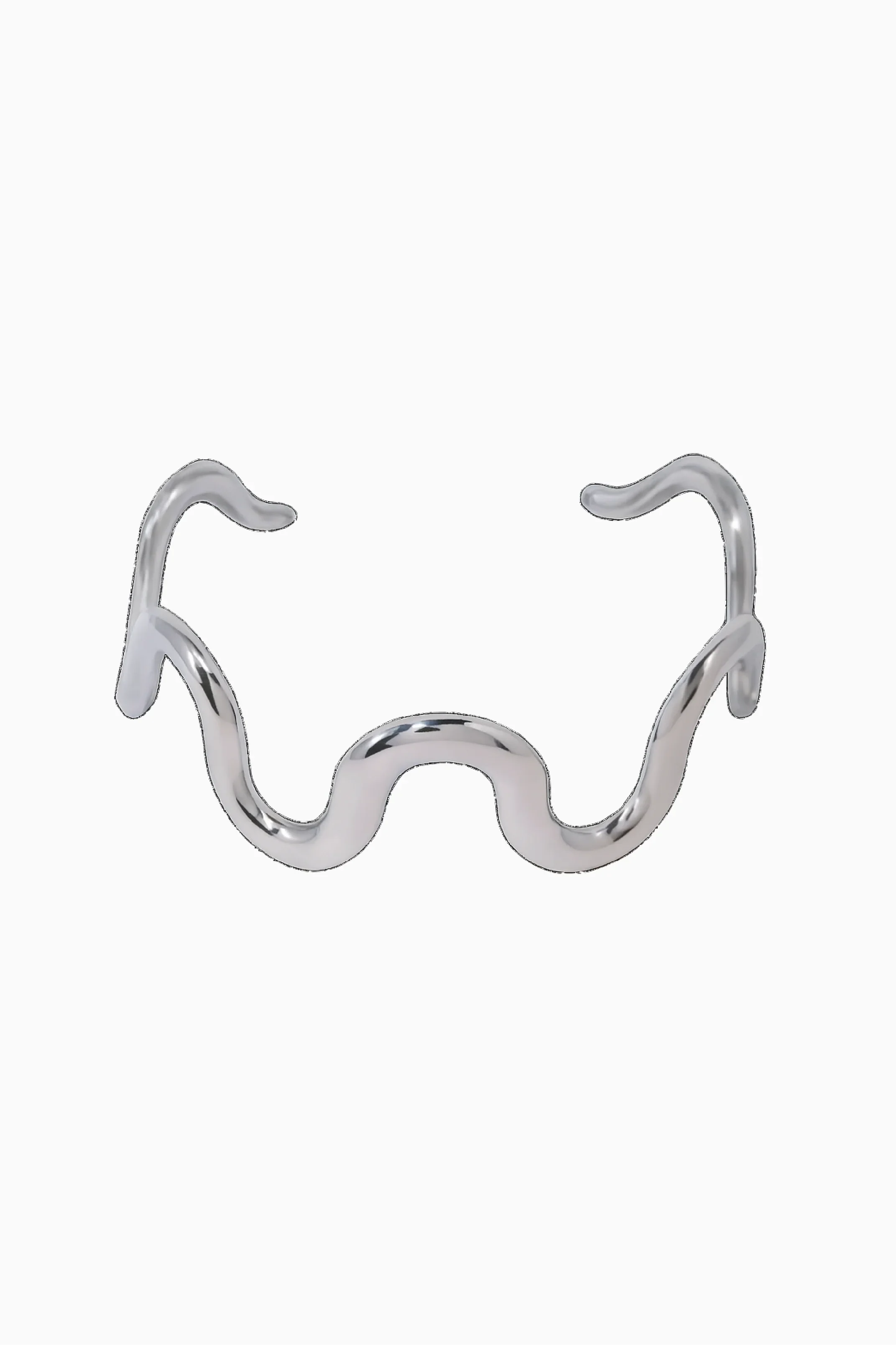 Silver metallic clip on a white background