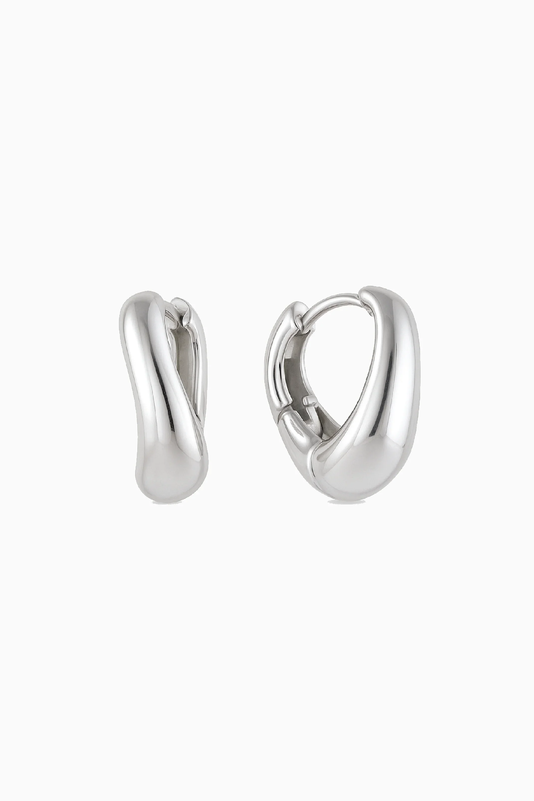 Pair of silver hoop earrings on a white background