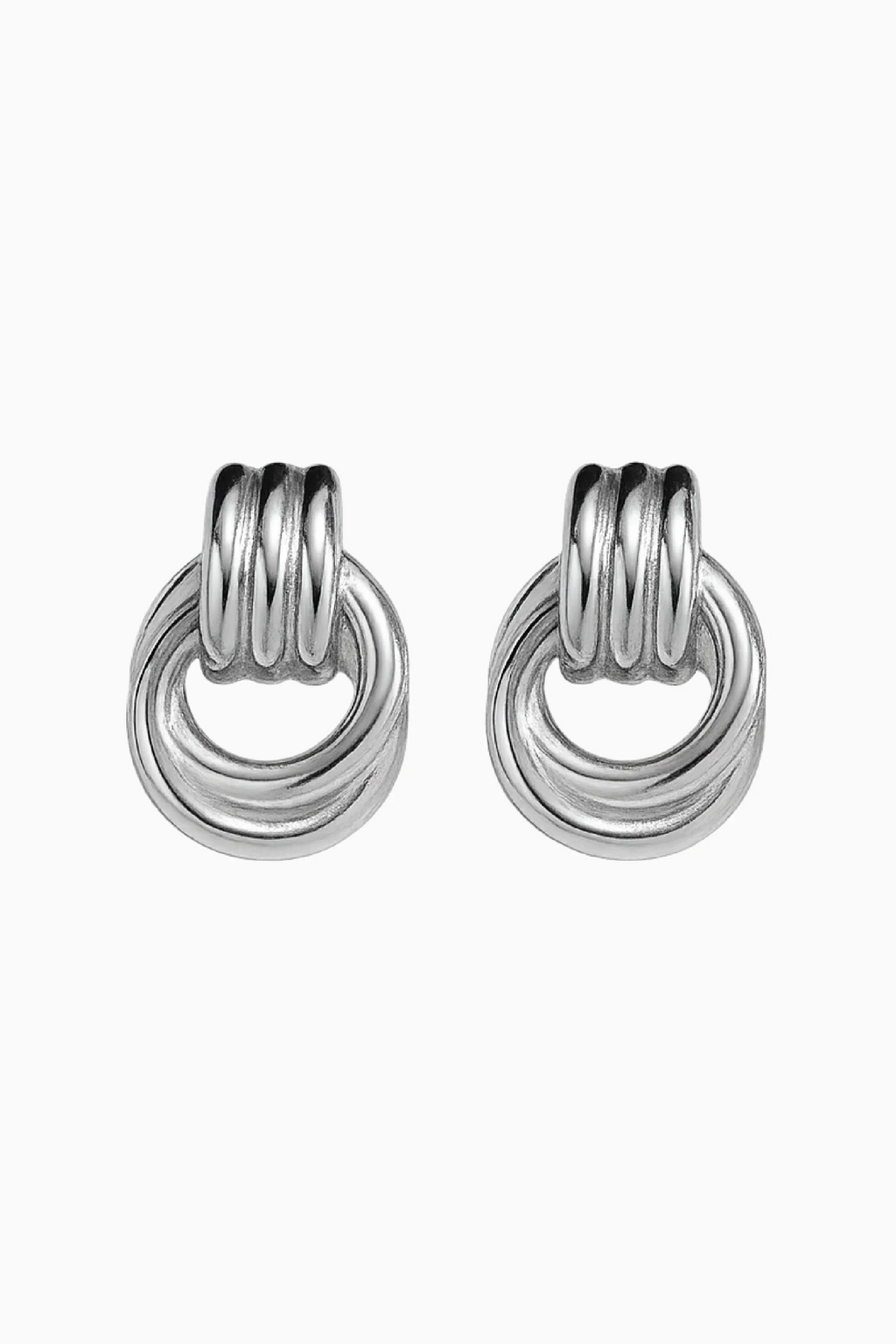 Pair of silver hoop earrings on a white background