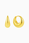 Gold hoop earrings on a white background