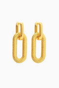 Gold hoop earrings on a white background