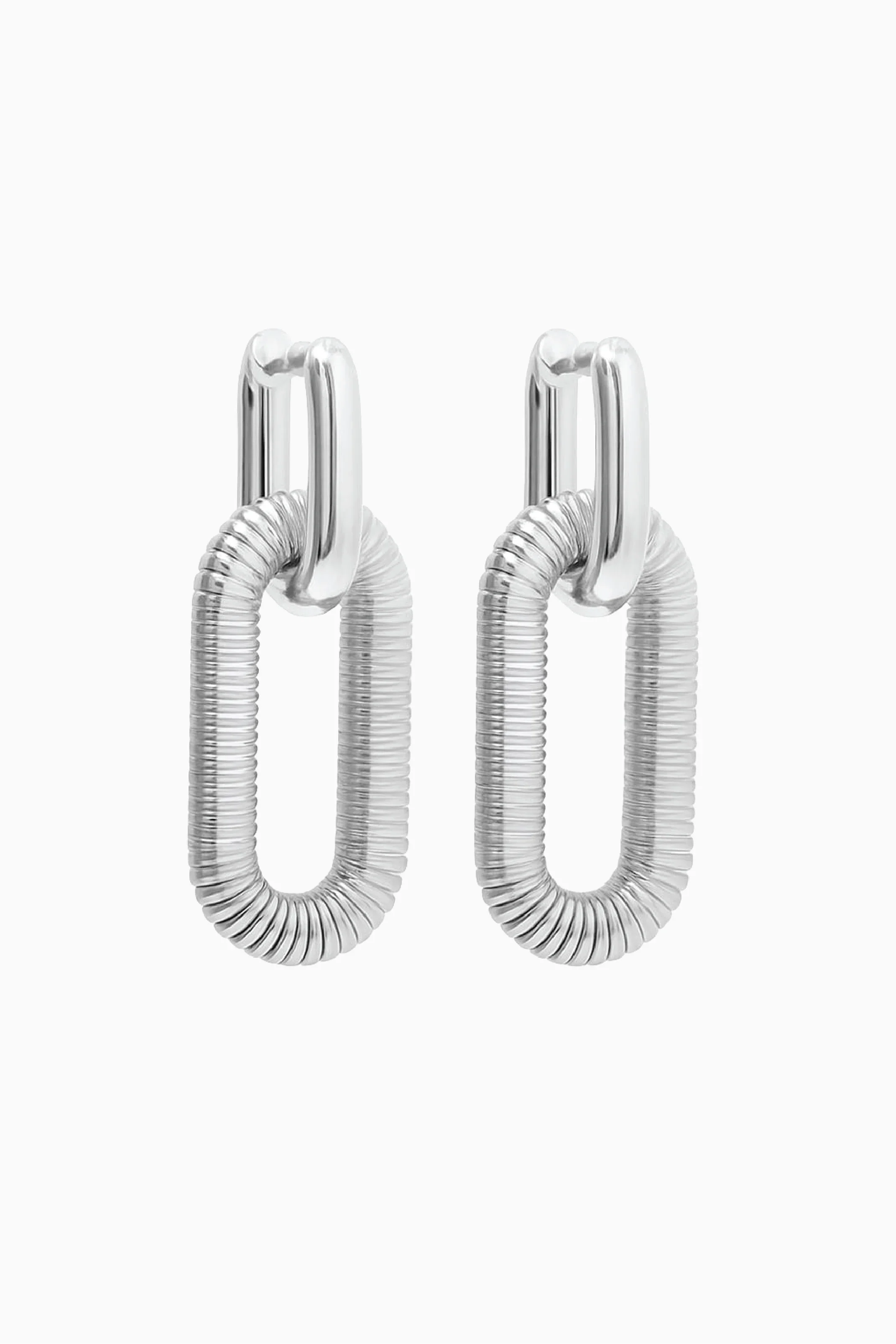 Pair of silver hoop earrings on a white background