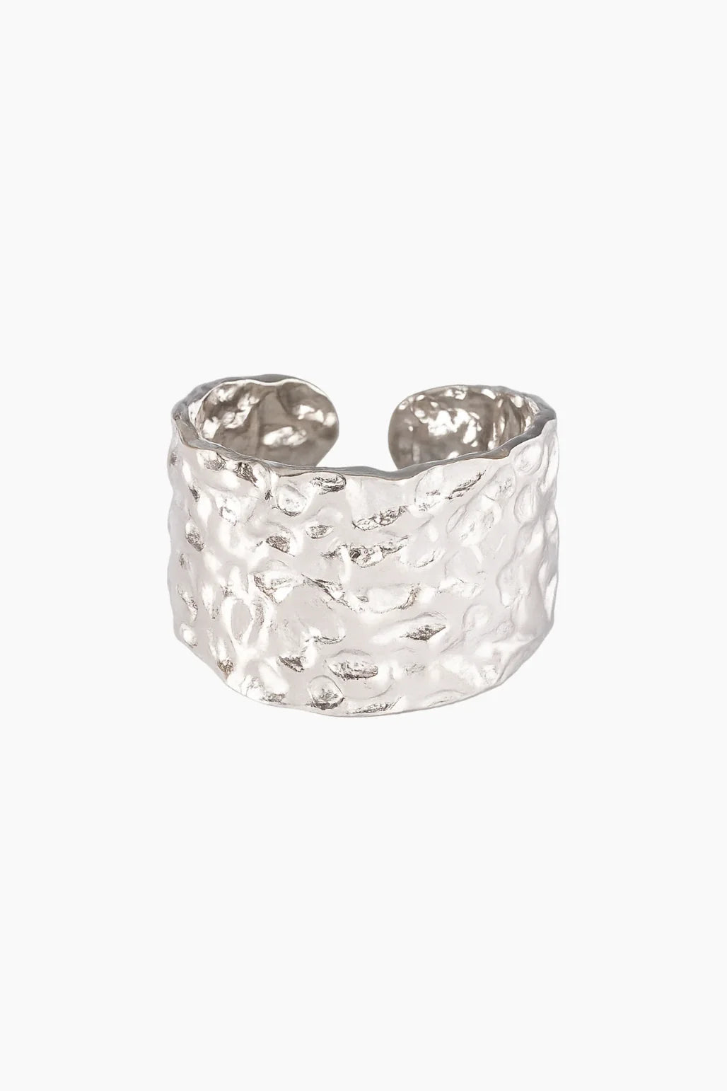 Silver textured ring on a white background